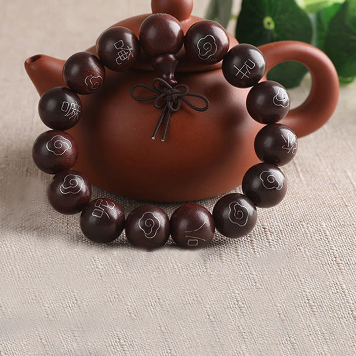Buddha Stones, 925er-Sterlingsilber, eingelegtes kleines Blatt, rotes Sandelholz, Om Mani Padme Hum-Charakter, glückverheißende Wolken, Schutzarmband