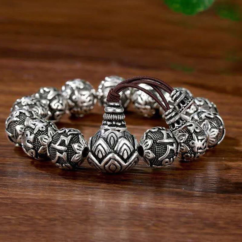 Buddha Stones Tibetisches Om Mani Padme Hum Amulett-Armband mit geschnitzten Legierungsperlen