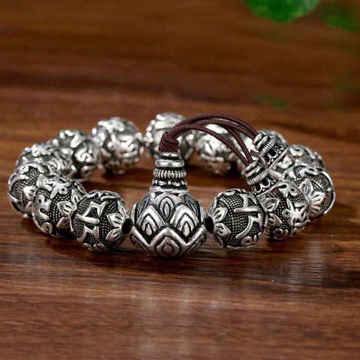 Buddha Stones Tibetisches Om Mani Padme Hum Amulett-Armband mit geschnitzten Legierungsperlen