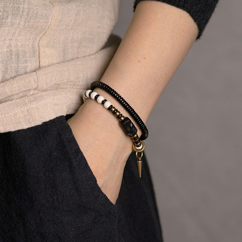 Buddha Stones Knochenperlen Ebenholz Kupfer Stärke Paar Armband