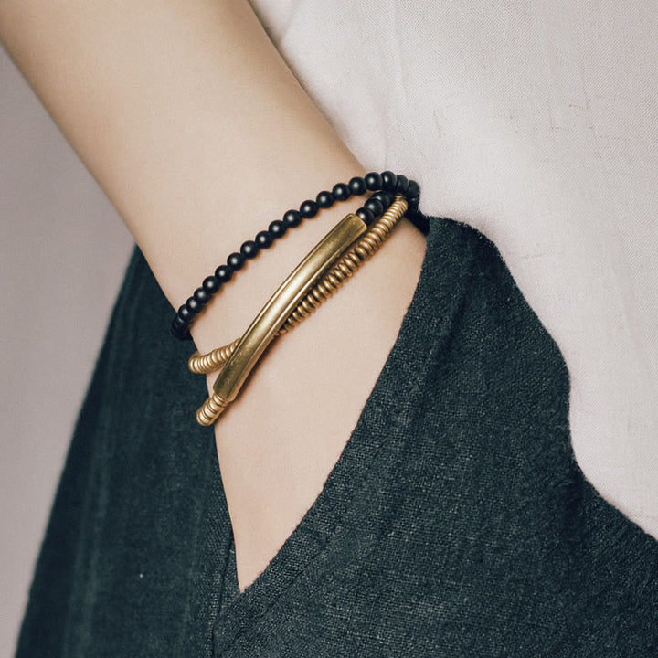 Tibetisches dreifach gewickeltes Armband mit verschiedenen Achatsteinen und Kupferschutz