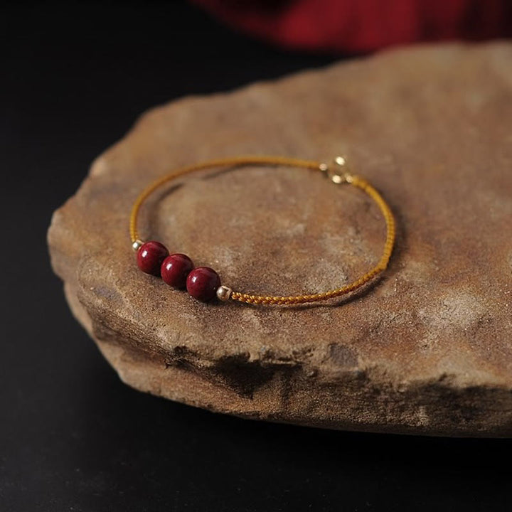 Buddha Stones 14K vergoldetes natürliches Zinnober-Segensband-Geflochtenes Armband