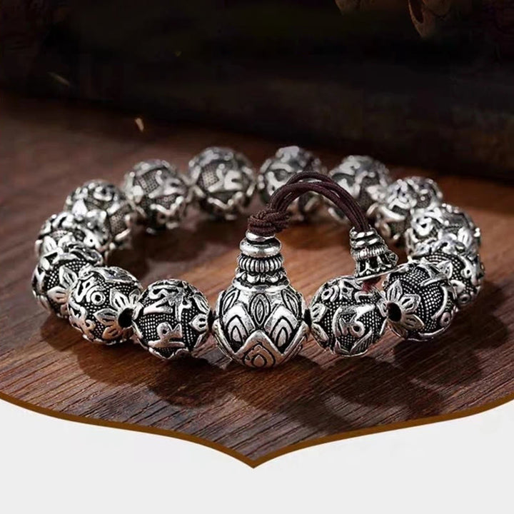 Buddha Stones Tibetisches Om Mani Padme Hum Amulett-Armband mit geschnitzten Legierungsperlen