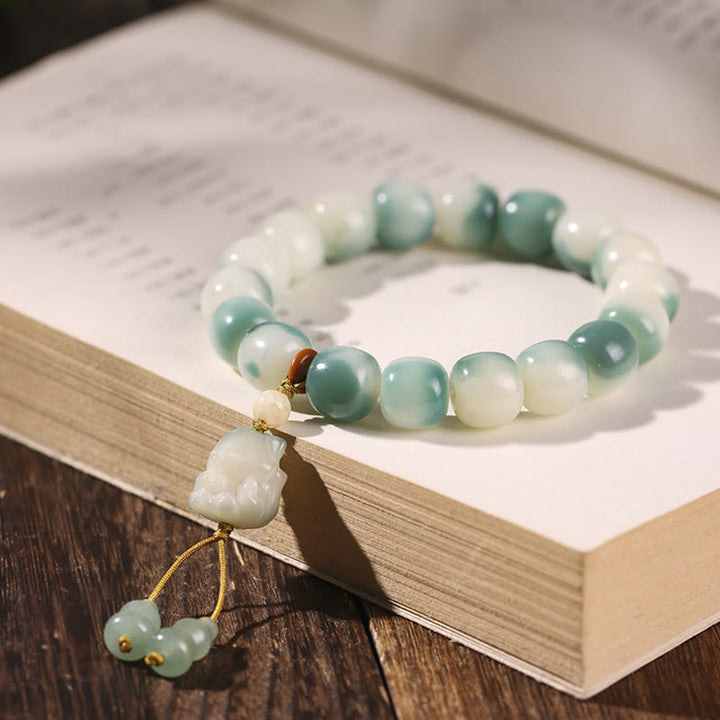 Buddha Stones, Farbverlauf, Bodhi-Samen, neunschwänziger Fuchs, Katzenpfote, Klaue, Kiefernzapfen, Friedensarmband - Neunschwänziger Fuchs (Neunschwänziger Fuchs, zufällige Farbe, Handgelenkumfang 16–17 cm) - image 1