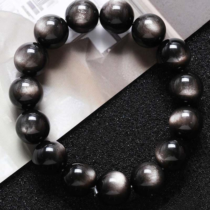 Buddha Stones Natürliches Obsidian-Armband mit silbernem Glanz und beruhigendem Schutz