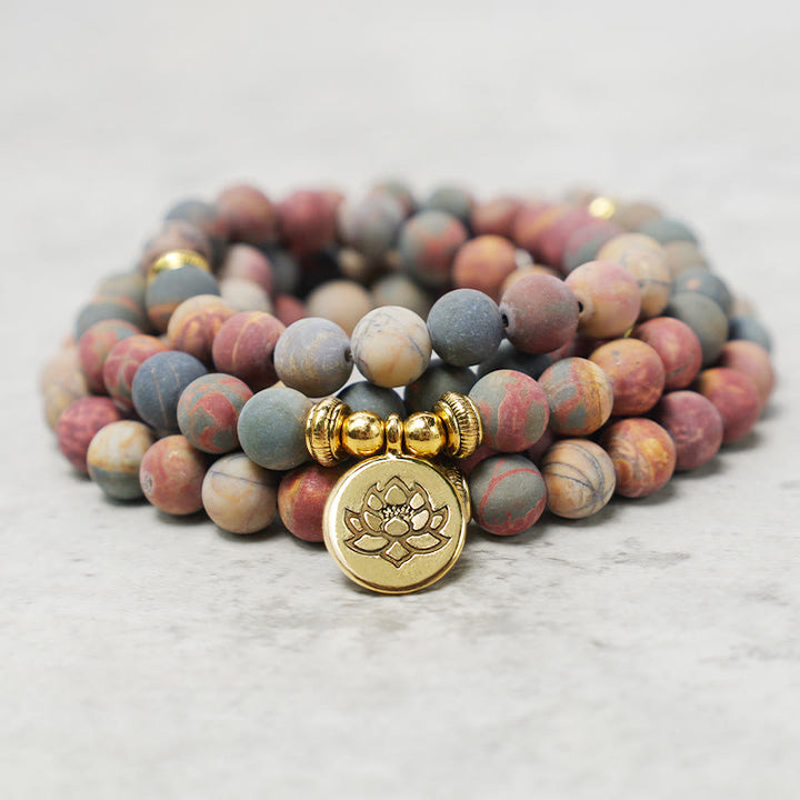 Buddha Stones 108 Mala Perlen Picasso Jaspis Stein Mut Energie Armband - image 1