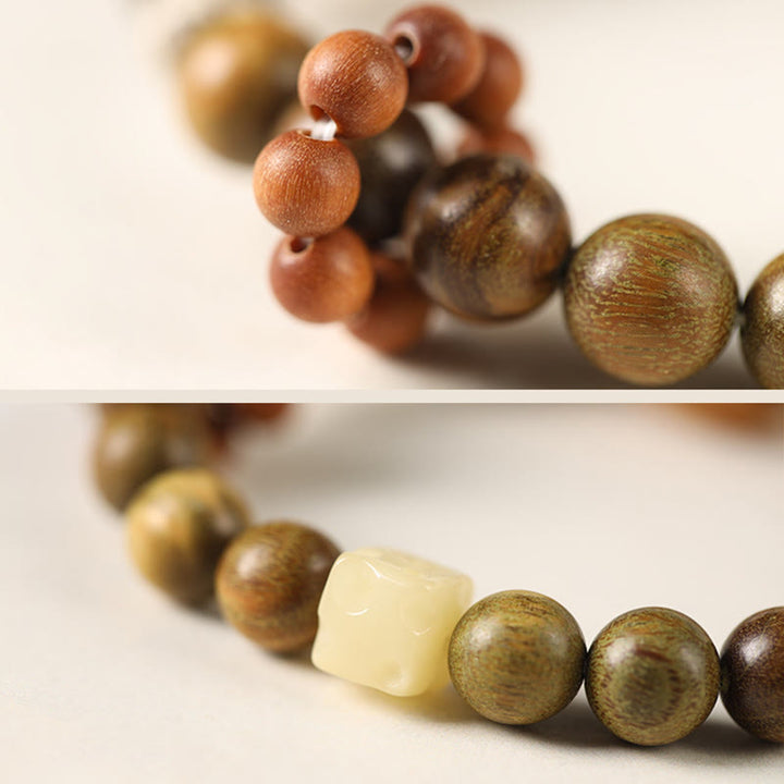 Buddha Stones Grünes Sandelholz Ebenholz Holz Katze Frieden beruhigendes Armband - image 5