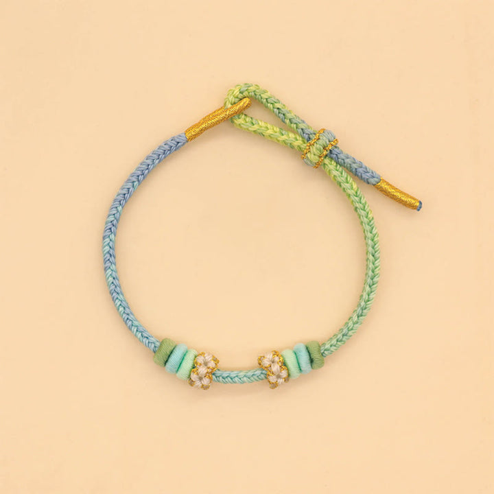 Buddha Stones Handgefertigtes achtfädiges Friedensknoten-Pfirsichblütenknoten-Glücksseil-geflochtenes Armband - image 5