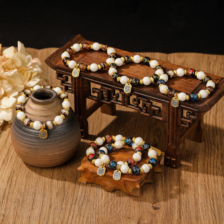 Buddha Stones, tibetische Zakiram-Göttin des Reichtums, Charm-Charm, Liuli, Glas, Weihrauch, Asche, Porzellanperlen, Schutzarmband