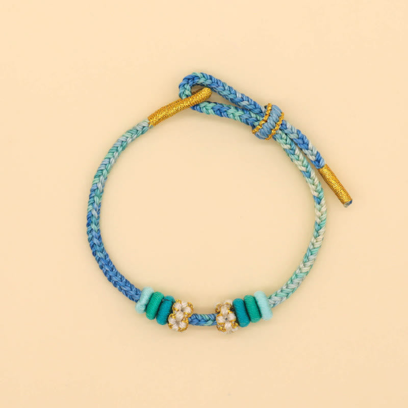 Buddha Stones Handgefertigtes achtfädiges Friedensknoten-Pfirsichblütenknoten-Glücksseil-geflochtenes Armband - image 11