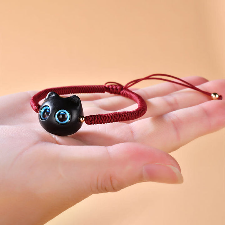 Buddha Stones Ebenholz-Katzenkopf-Muster, geflochtenes Armband mit Friedens-King-Kong-Knoten - image 5