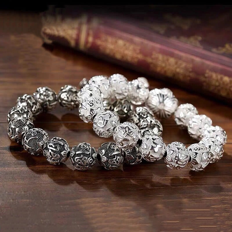 Buddha Stones Tibetisches Om Mani Padme Hum Amulett-Armband mit geschnitzten Legierungsperlen