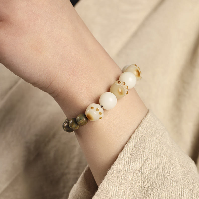 Buddha Stones natürliches grünes Sandelholz-Bodhi-Samen-Katzenpfoten-Klauen-Heilungsarmband - image 9