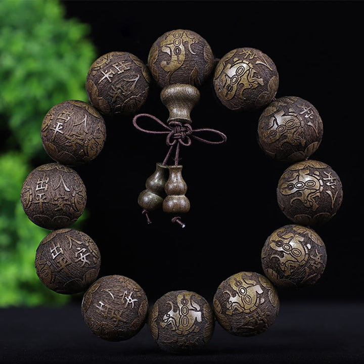 Buddha Stones Chinesisches Sternzeichen Palisander Ebenholz Kupfermünze PiXiu Geschnitztes Wärmearmband