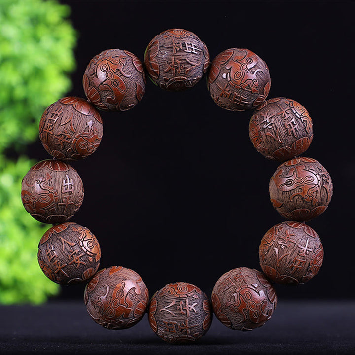 Buddha Stones Chinesisches Sternzeichen Palisander Ebenholz Kupfermünze PiXiu Geschnitztes Wärmearmband