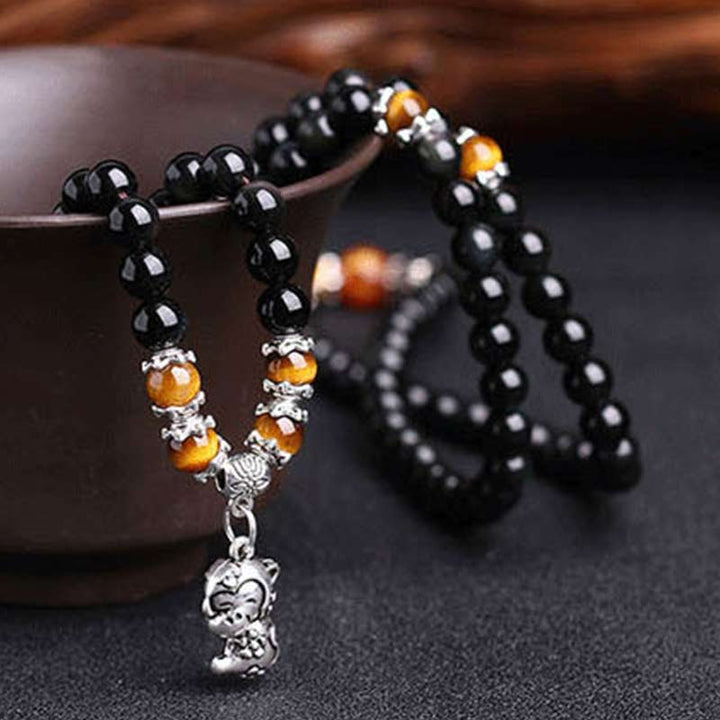 Chinesisches Sternzeichen 108 Perlen schwarzes Obsidian-Tigerauge-Glücks-Mala-Armband