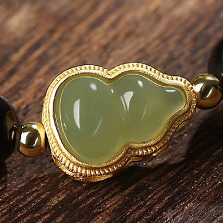 Natürliches schwarzes Obsidian-Hetian-Jade-Kürbis-Armband mit doppelter Glückskraft