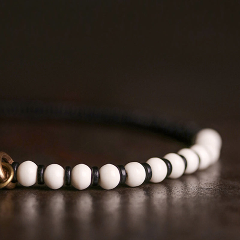 Buddha Stones Knochenperlen Ebenholz Kupfer Stärke Paar Armband