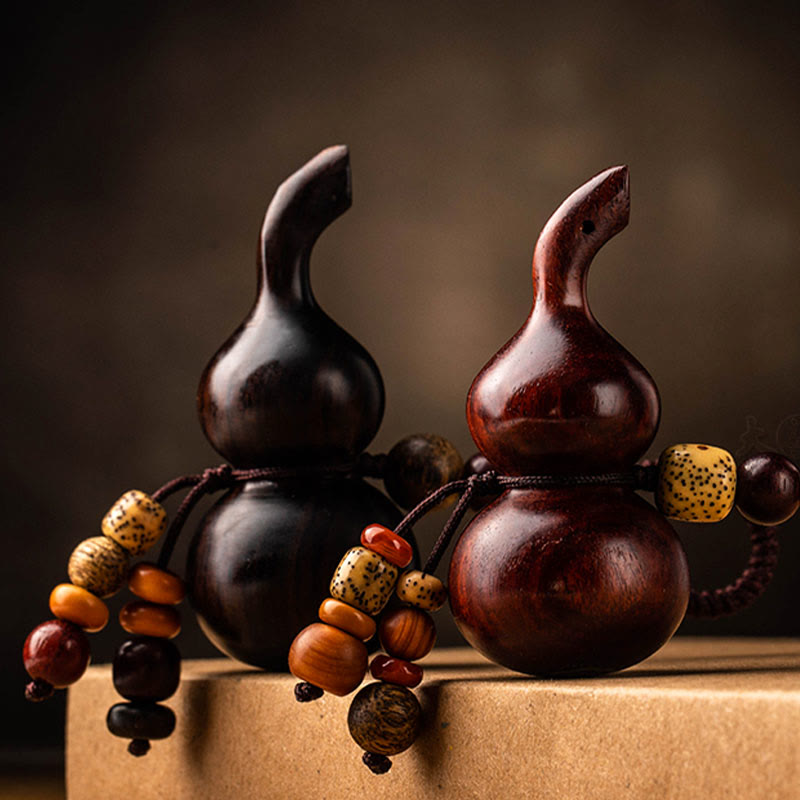 Schlüsselanhänger aus tibetischem Ebenholz, kleinem Blatt, rotem Sandelholz, Kürbis, Glücksschutz