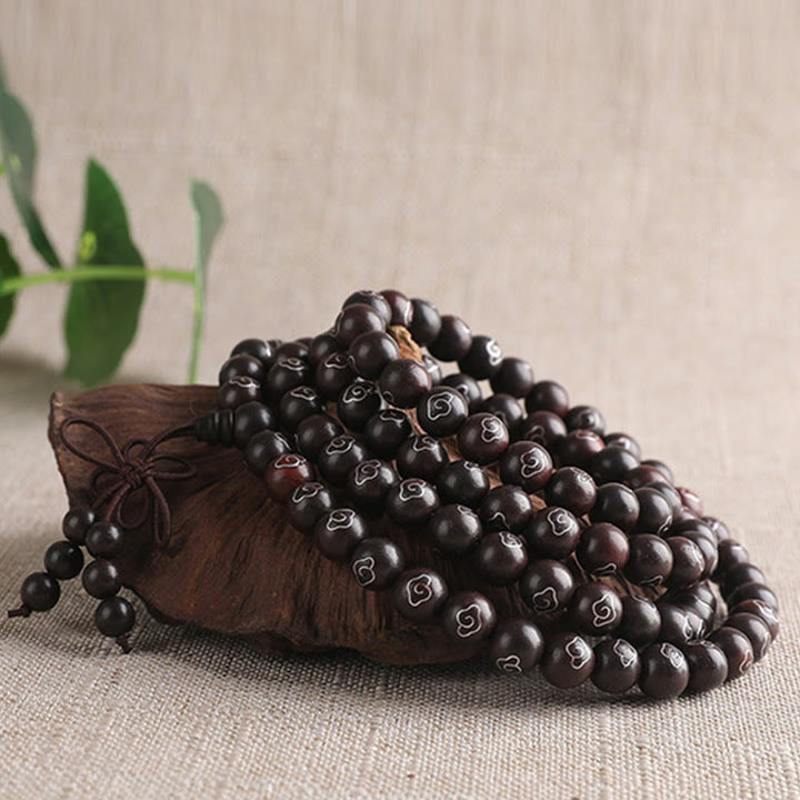 Buddha Stones, 925er-Sterlingsilber, eingelegtes kleines Blatt, rotes Sandelholz, Om Mani Padme Hum-Charakter, glückverheißende Wolken, Schutzarmband