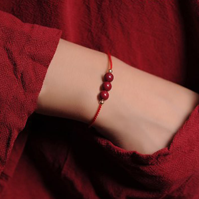 Buddha Stones 14K vergoldetes natürliches Zinnober-Segensband-Geflochtenes Armband