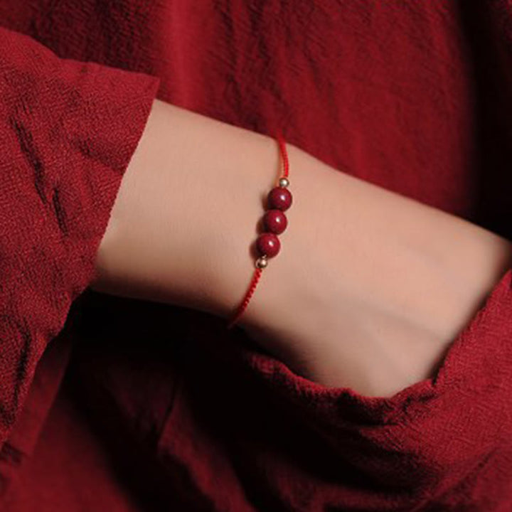Buddha Stones 14K vergoldetes natürliches Zinnober-Segensband-Geflochtenes Armband