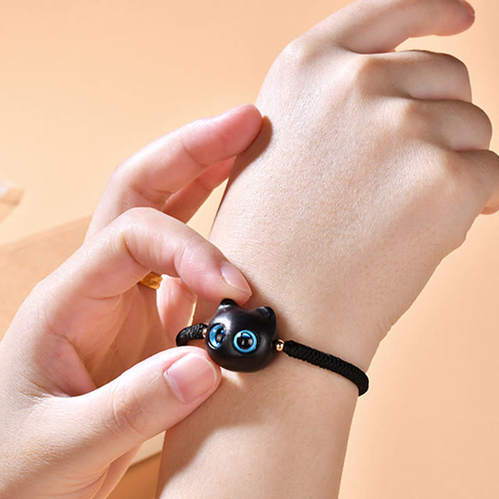 Buddha Stones Ebenholz-Katzenkopf-Muster, geflochtenes Armband mit Friedens-King-Kong-Knoten - image 19