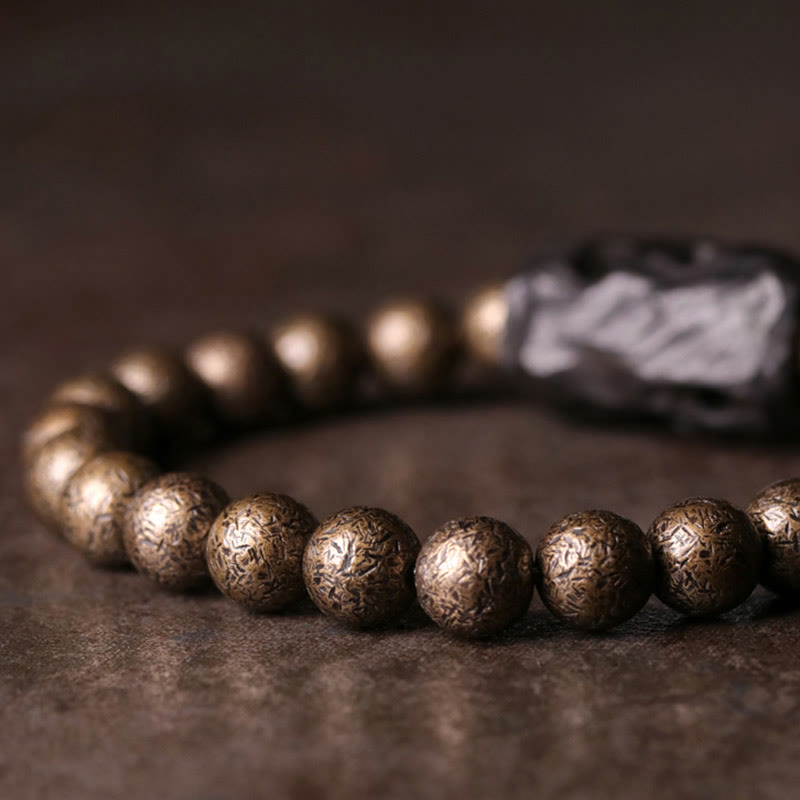 Buddha Stones Tibet Ebenholz Kupfer Peace Balance Perlenarmband