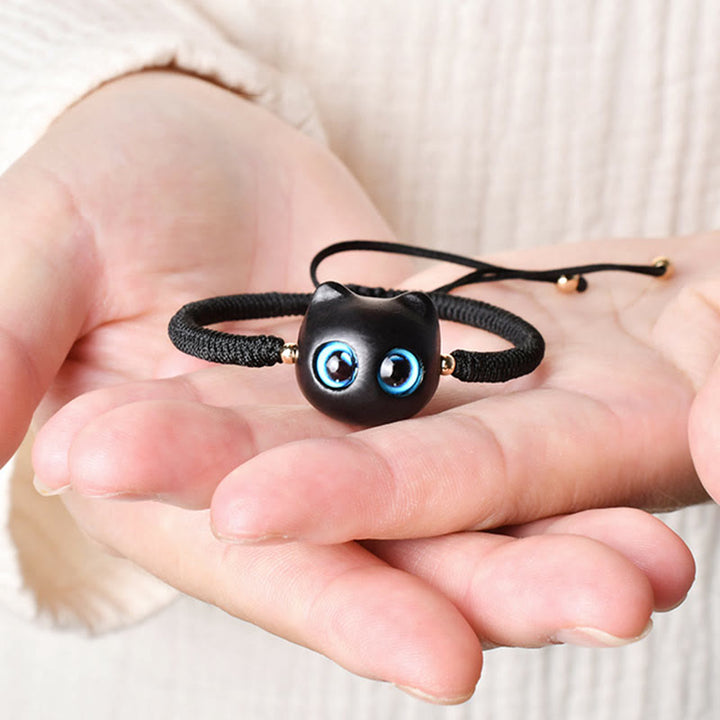 Buddha Stones Ebenholz-Katzenkopf-Muster, geflochtenes Armband mit Friedens-King-Kong-Knoten - image 18