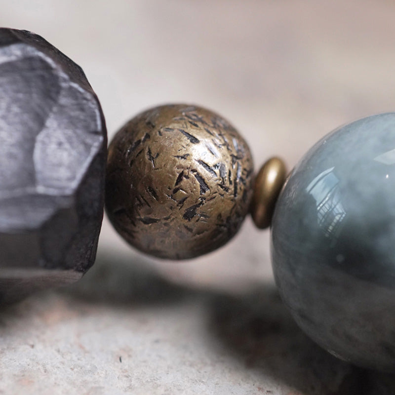 Buddha Stones Eagle's Eye Stein Ebenholz Kupfer Selbstvertrauen Paar Armband