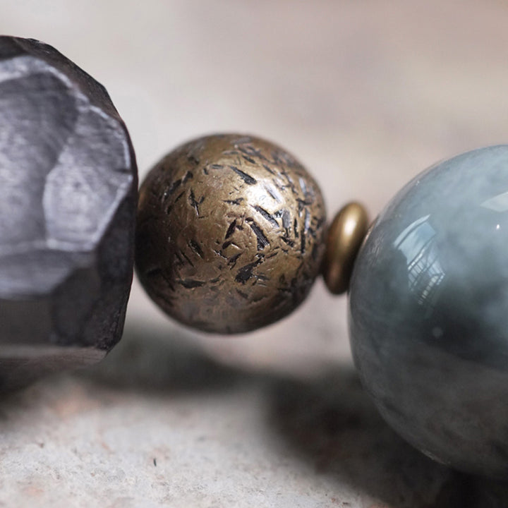 Buddha Stones Eagle's Eye Stein Ebenholz Kupfer Selbstvertrauen Paar Armband