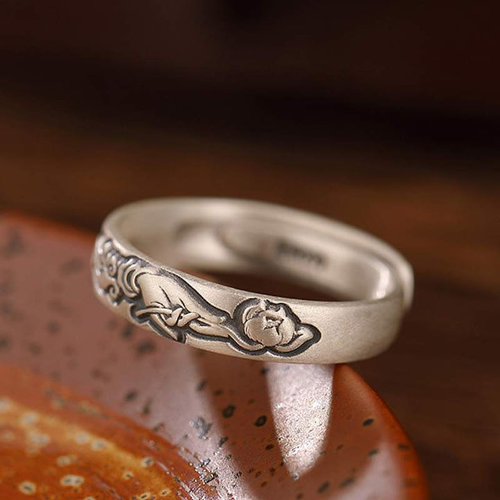 Erleuchtungsring aus 999er-Sterlingsilber mit Lotus- und Pfingstrosenblüten