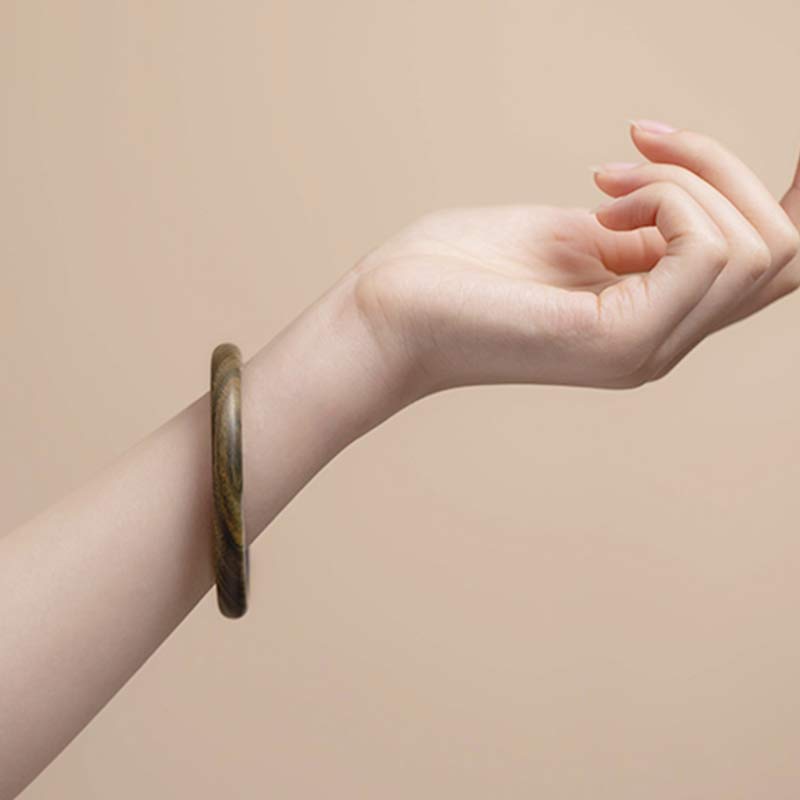 Buddha Stones Tibetisches kleines Blatt rotes Sandelholz Ebenholz grünes Sandelholz Schutzarmband Armreif