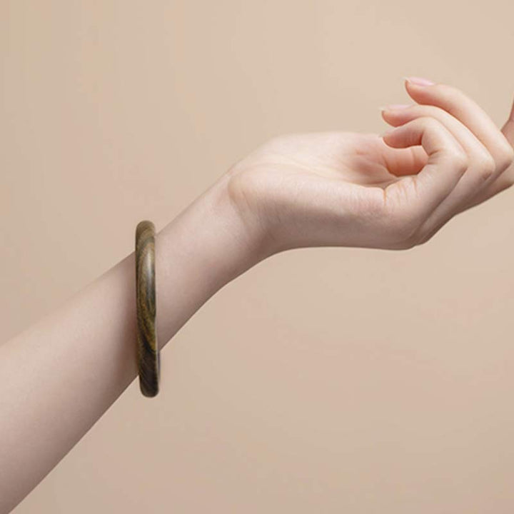 Buddha Stones Tibetisches kleines Blatt rotes Sandelholz Ebenholz grünes Sandelholz Schutzarmband Armreif