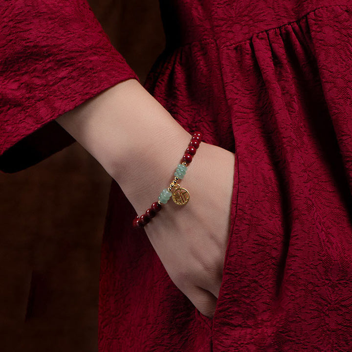 Armband mit Buddha Stonesn, Zinnober, grünem Aventurin, Glückssegen