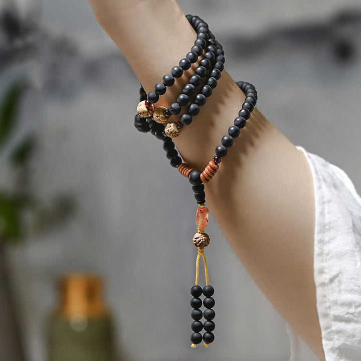 Buddha Stones Tibetisches Mala-Zypressen-Bodhi-Samen-Heilarmband aus rotem Achat