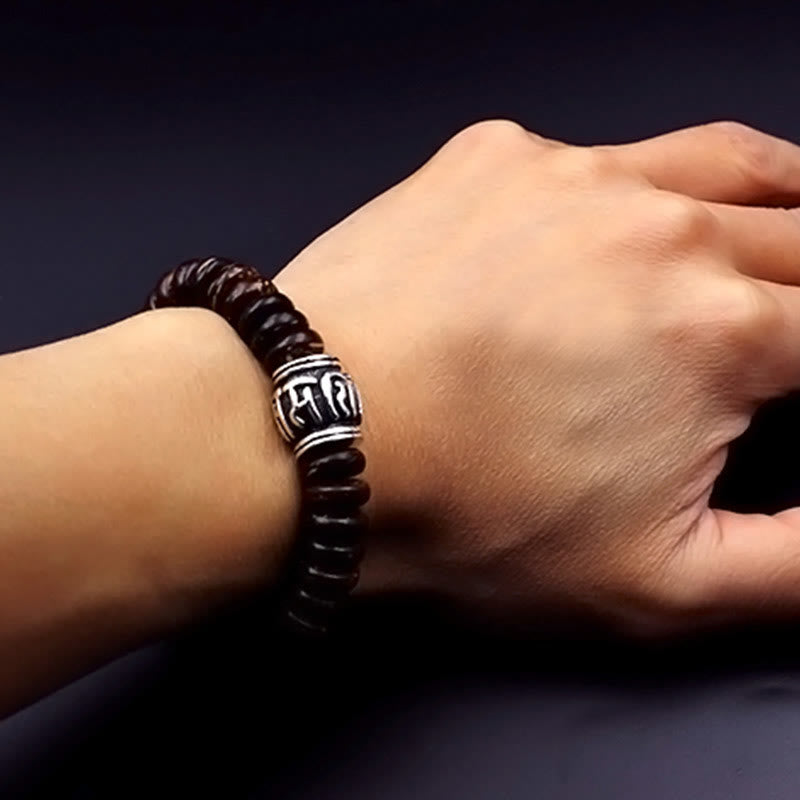 Buddha Stones Natürliches tibetisches Om Mani Padme Hum Positive Armband aus Kokosnussschale