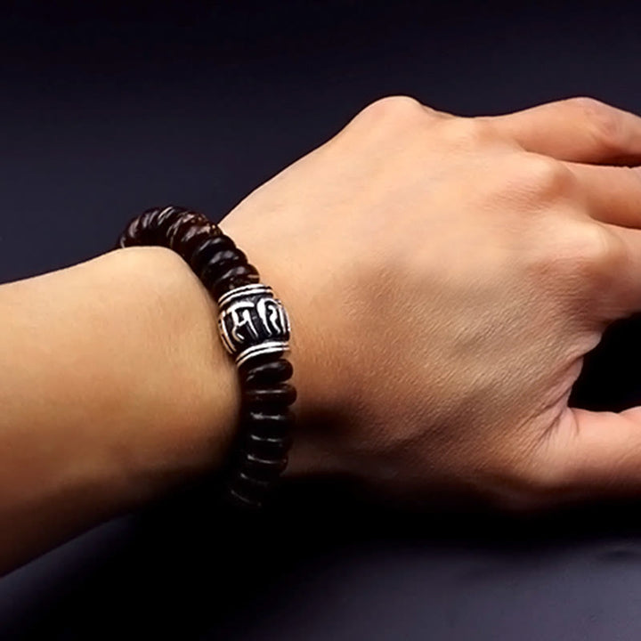 Buddha Stones Natürliches tibetisches Om Mani Padme Hum Positive Armband aus Kokosnussschale