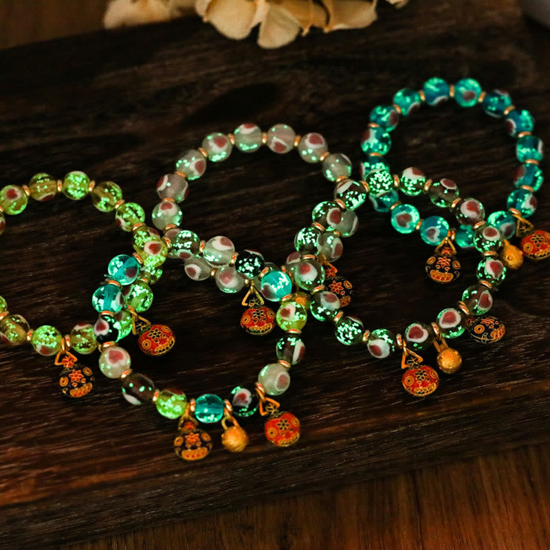 Buddha Stones Gold Schluckendes Biest Familie Rosa Liebesherz Leuchtendes fluoreszierendes Liuli-Glasperlenarmband