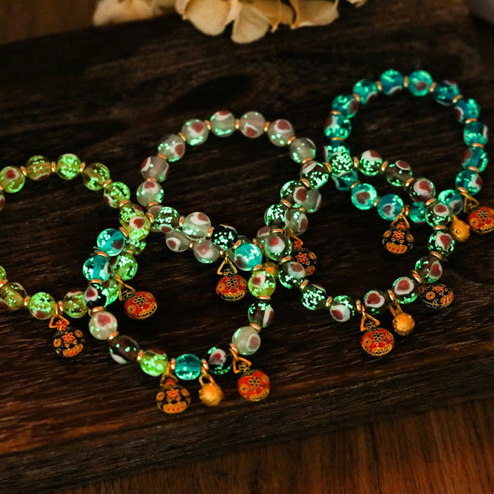 Buddha Stones Gold Schluckendes Biest Familie Rosa Liebesherz Leuchtendes fluoreszierendes Liuli-Glasperlenarmband