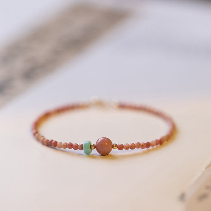 Buddha Stones 14K vergoldetes natürliches Rhodonit-Liebesenergie-Kettenarmband