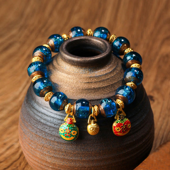Buddha Stones Gold Schlucktier Familie Charm Liuli Glasperlen Glücksarmband