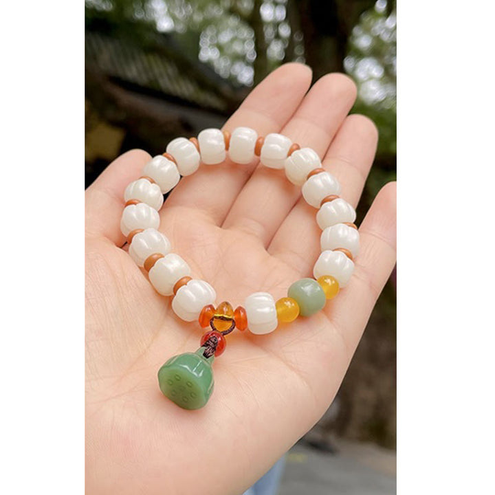 Natürliches Bodhi-Samen-Rotachat-Bodhi-Ruheharmonie-Gravur-Kürbisperlen-Lotus-Armband