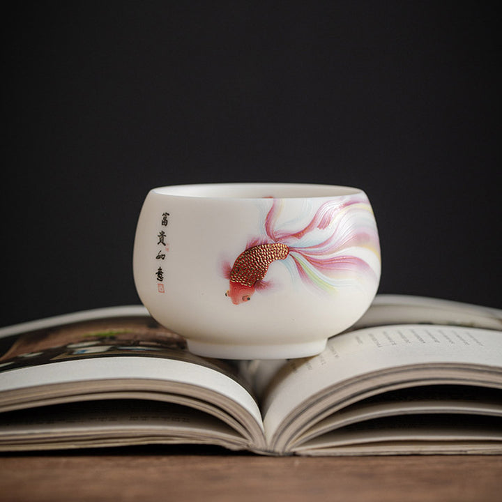 Buddha Stones Koi Fisch Weiß Porzellan-Keramik-Teetasse Kung-Fu-Teetasse