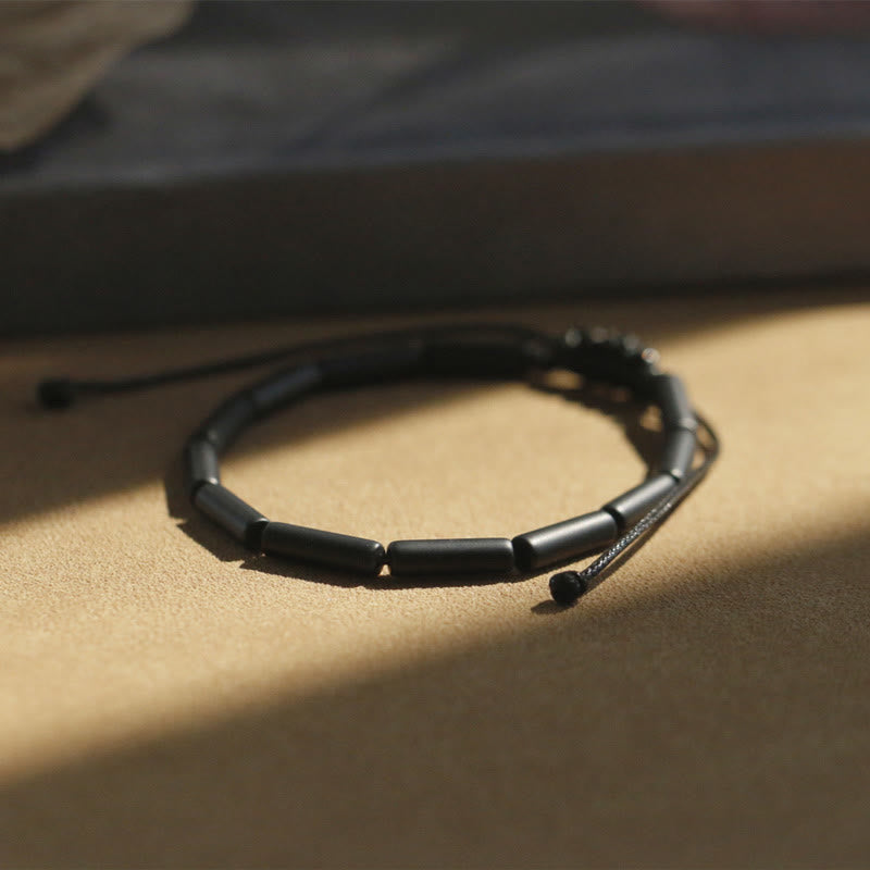 Buddha Stones Schwarzes Onyxperlen-Stützschutzarmband