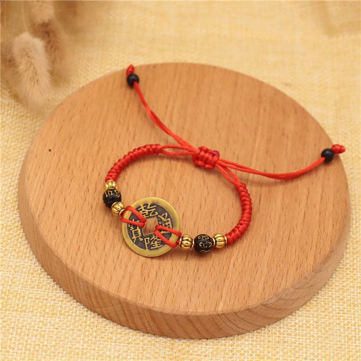 Armband mit Buddha Stonesn, Kupfermünze, Glücksbringer, rote Schnur