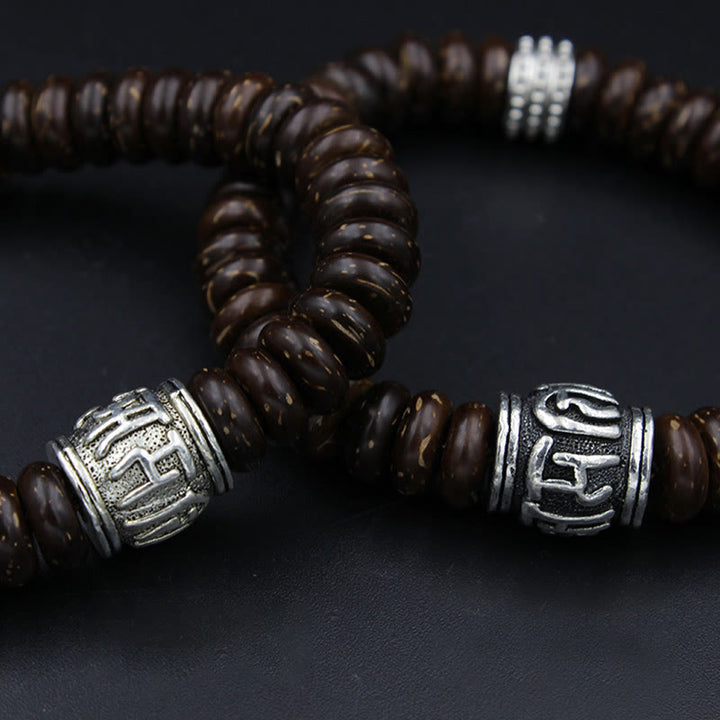 Buddha Stones Natürliches tibetisches Om Mani Padme Hum Positive Armband aus Kokosnussschale