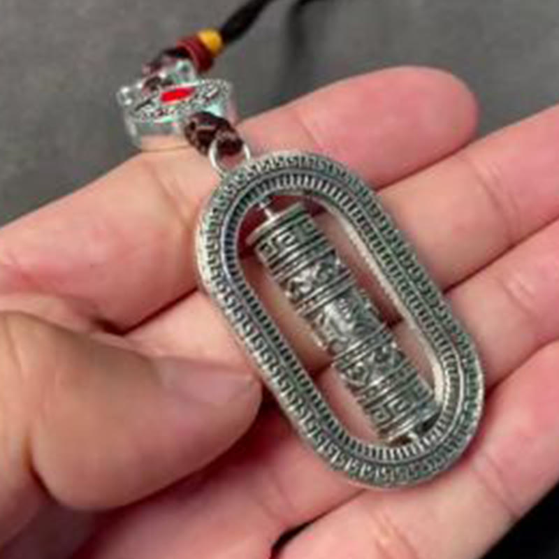 Tibet Om Mani Padme Hum Gebetsmühle Frieden drehbare Auto-Hängedekoration