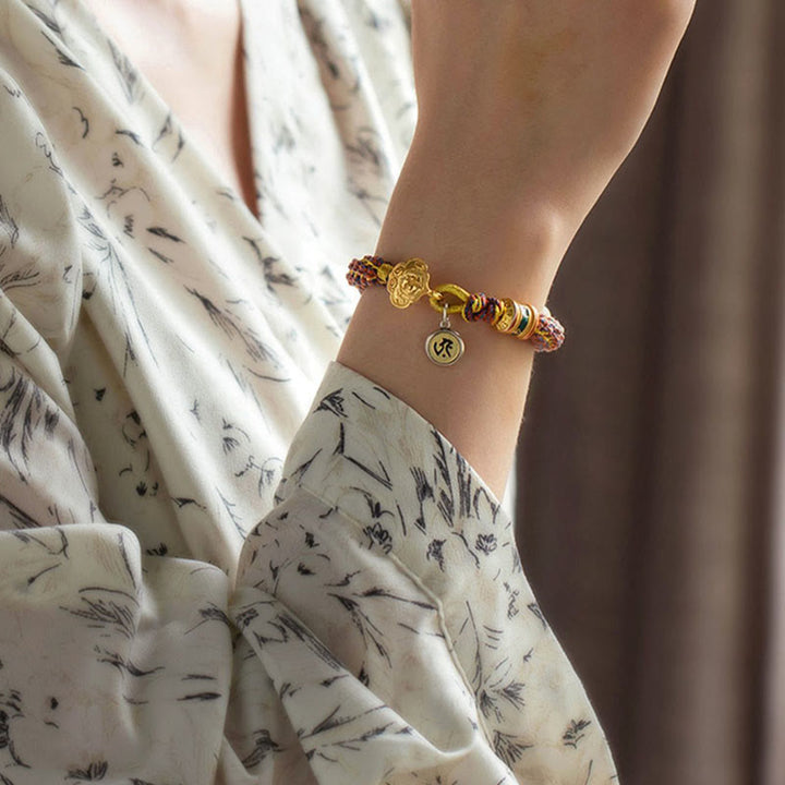 Buddha Stones 925 Sterling Silber Chinesisches Sternzeichen Natal Buddha Om Mani Padme Hum Glücksglocke geflochtenes Schnurarmband