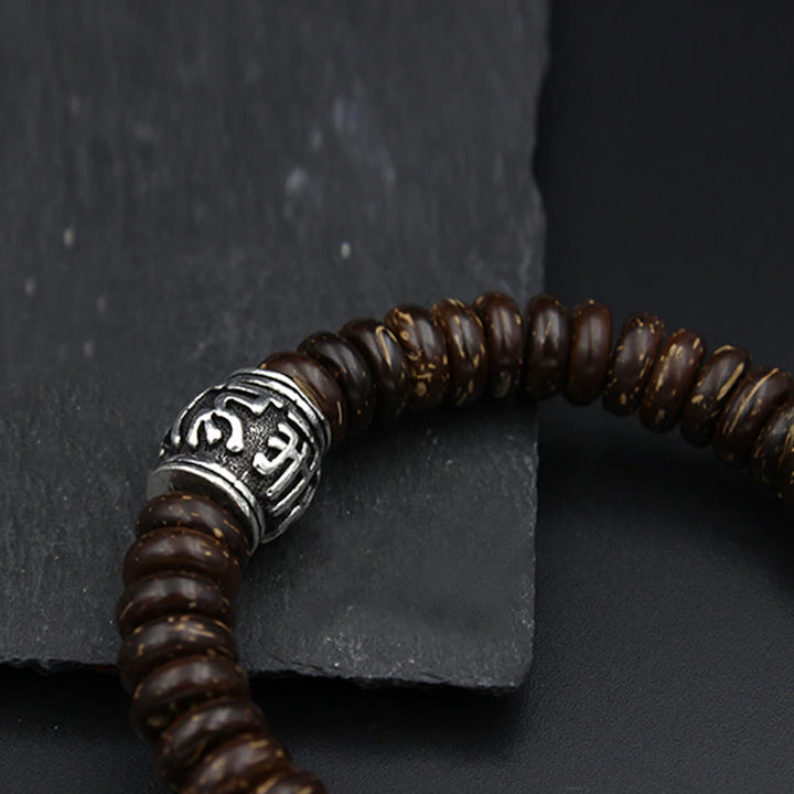 Buddha Stones Natürliches tibetisches Om Mani Padme Hum Positive Armband aus Kokosnussschale
